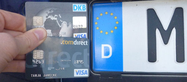 DKB and Comdirect VISA front of a German car number plates